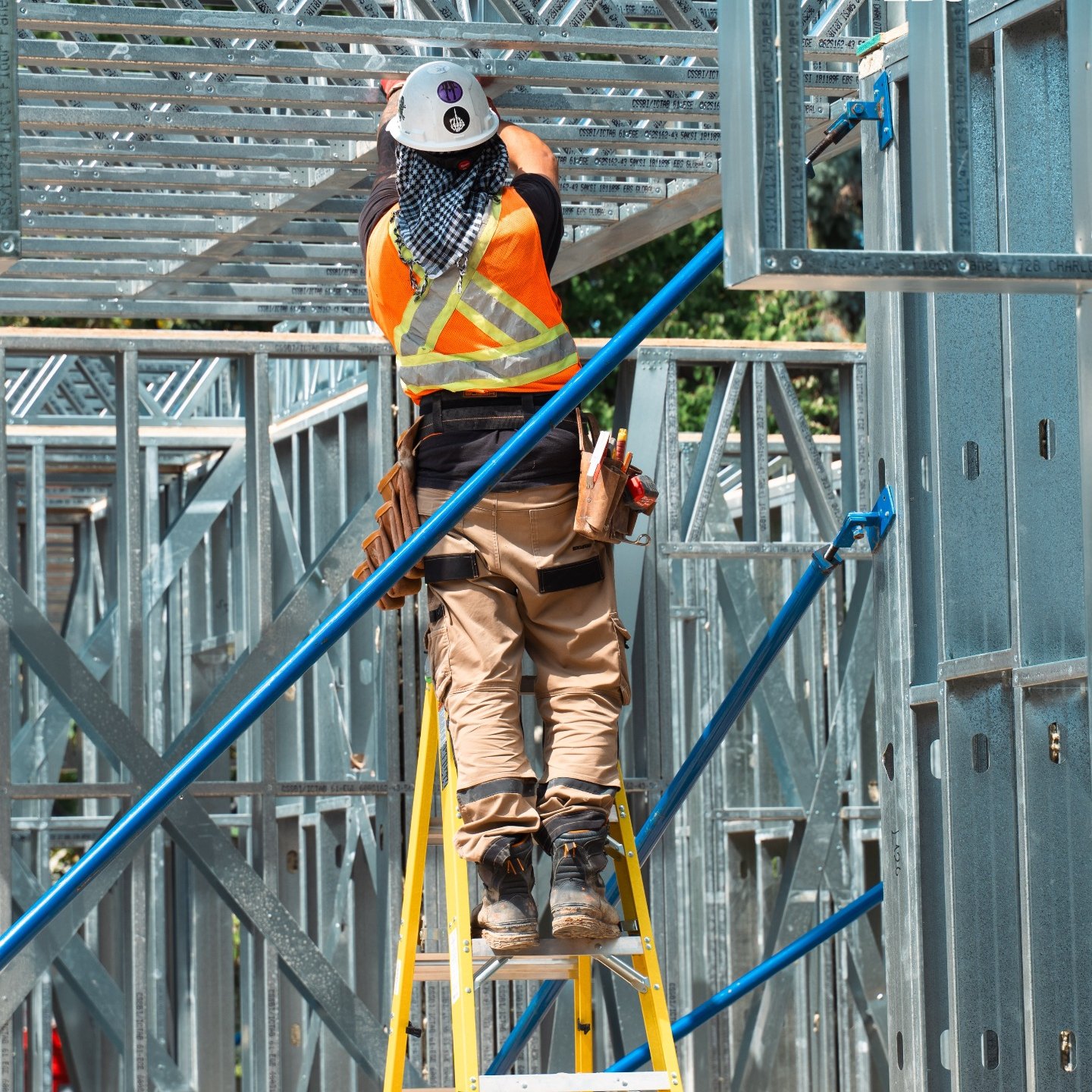 Setting the top track from the ladder.
