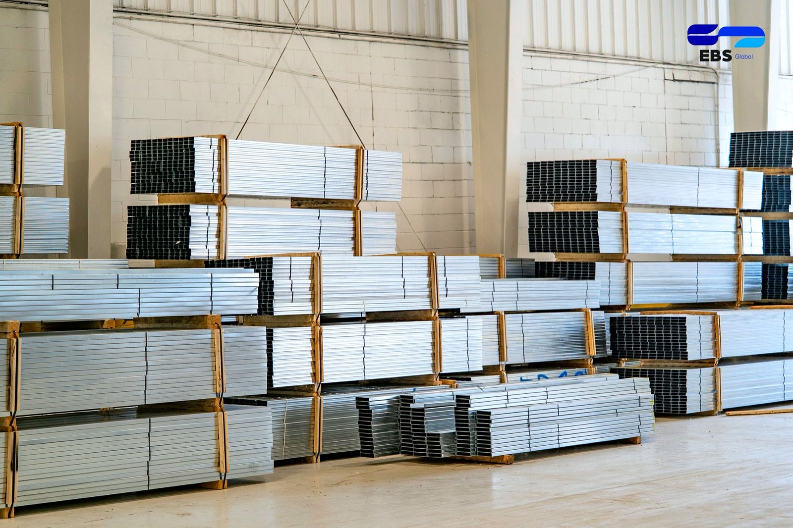 Bundles of finished cold-formed steel sections stacked in the EBS warehouse