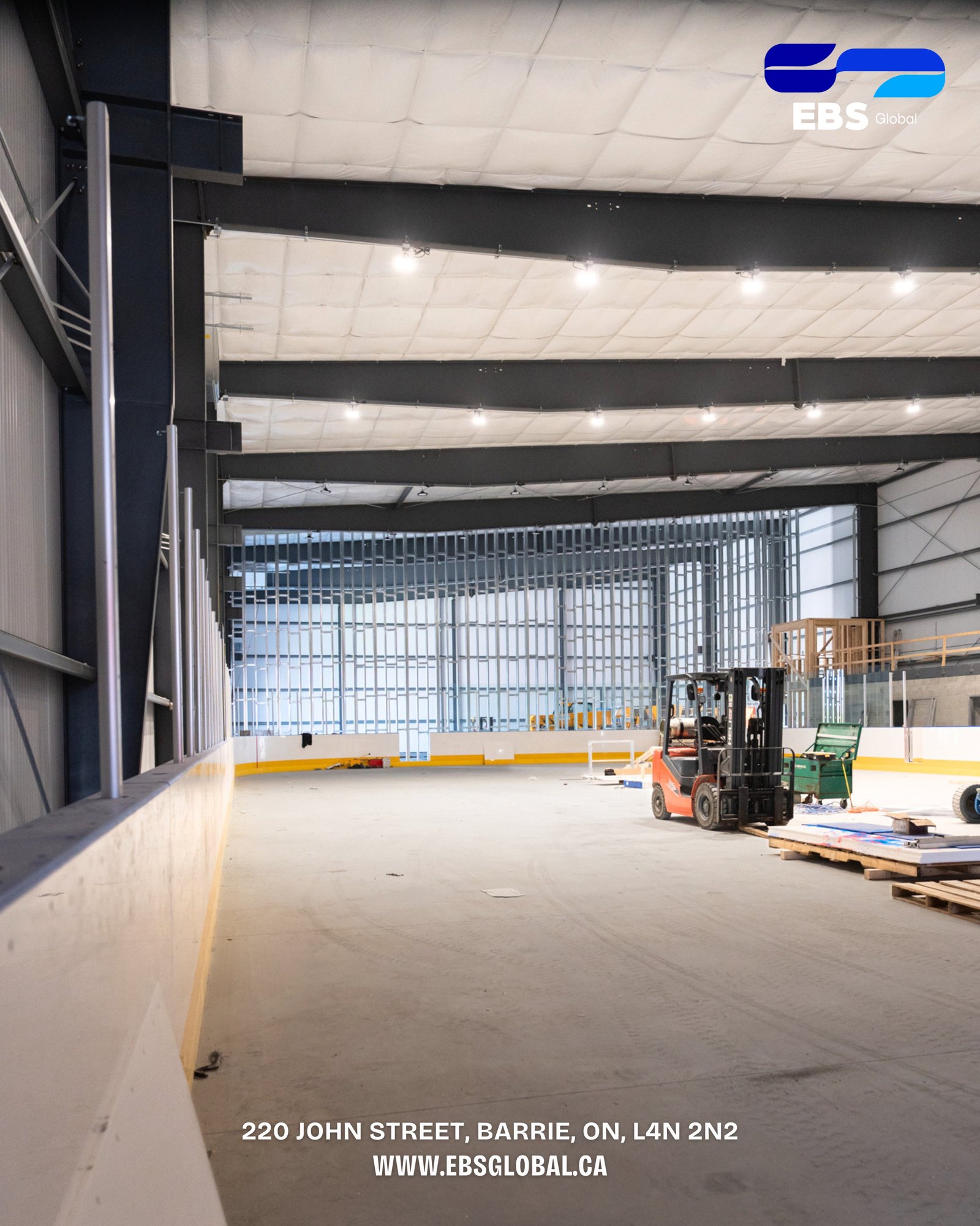 One of the oversized wall systems lifted into place.