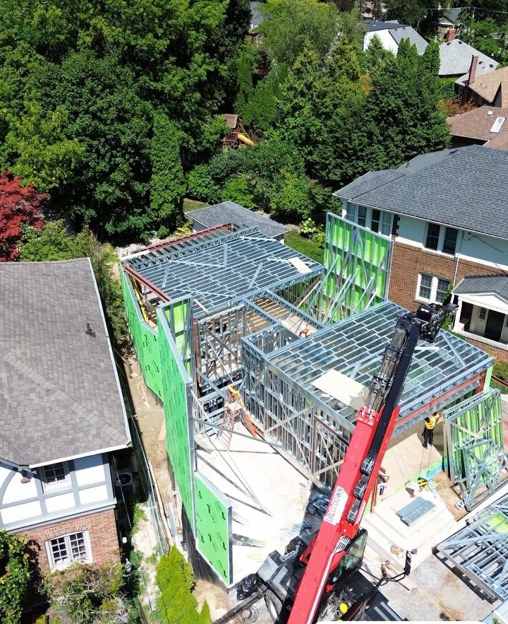 The frame from above, green sheathing going on.