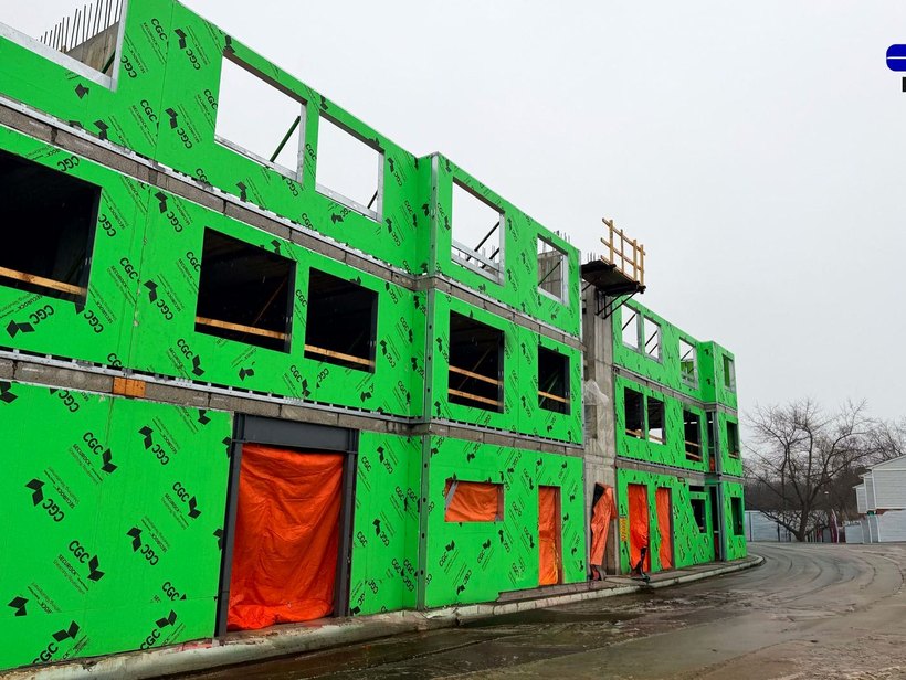 The six-storey London project, sheathed in green board