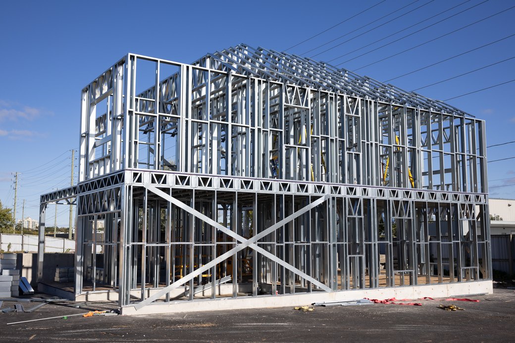 Two-storey cold-formed steel house frame with gable roof trusses