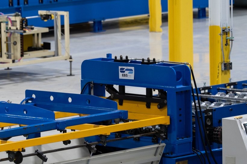Roll-forming line with the EBS Global plate on the press frame